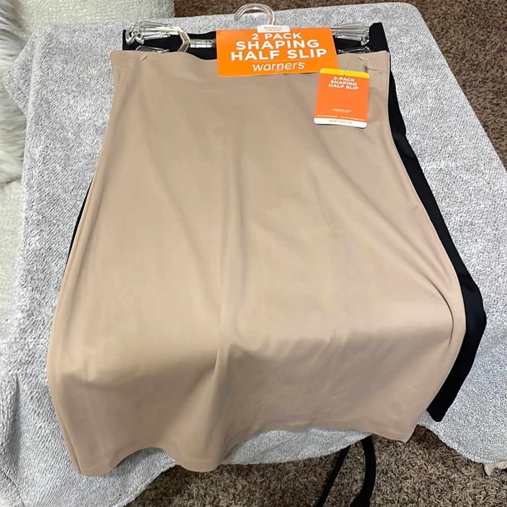 New with tags size M half slip, one beige one black